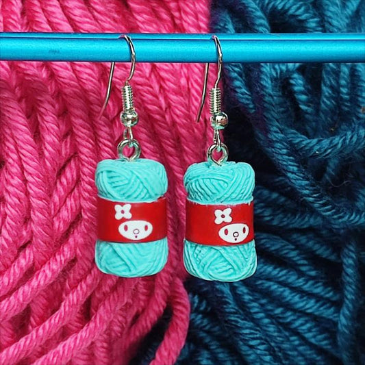 Boucles d'oreilles Pelotes de laine bleu