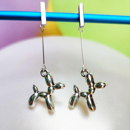 Boucles d'oreilles chien ballon argentées vue 1