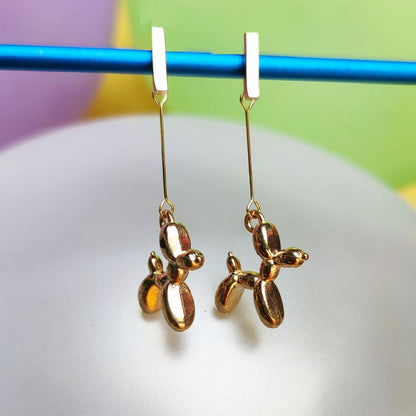 Boucles d'oreilles chien ballon dorées  vue 3