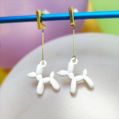 Boucles d'oreilles chien ballon dorées blanc vue 2