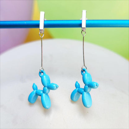 Boucles d'oreilles chien ballon argentées bleu clair vue 1