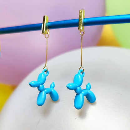 Boucles d'oreilles chien ballon dorées bleu clair vue 2