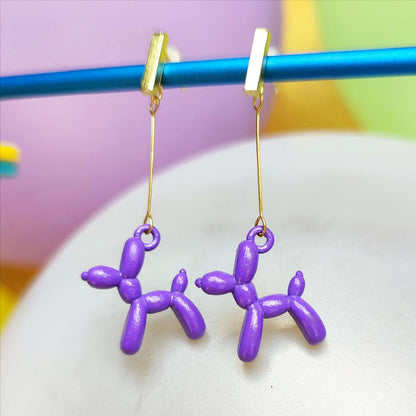 Boucles d'oreilles chien ballon dorées violet vue 1