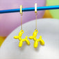 Boucles d'oreilles chien ballon dorées jaune vue 1