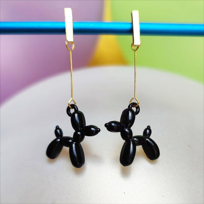 Boucles d'oreilles chien ballon noir dorées vue 2