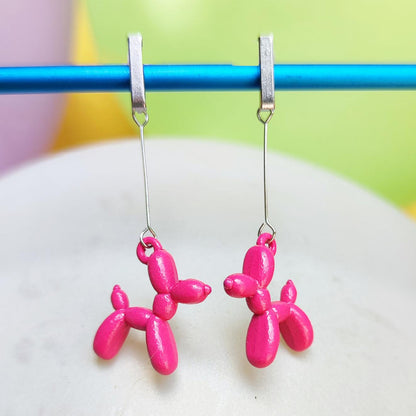Boucles d'oreilles chien ballon argentées rose foncé vue 1