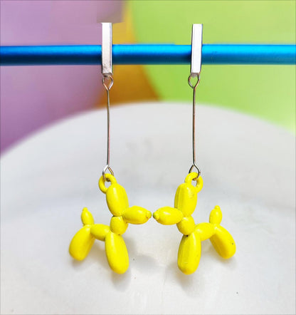 Boucles d'oreilles chien ballon argentées jaune vue 1