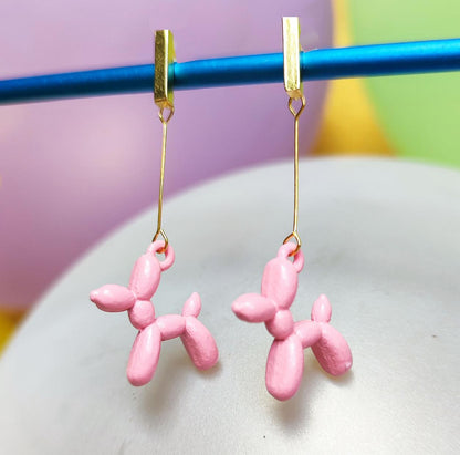 Boucles d'oreilles chien ballon dorées rose vue 1