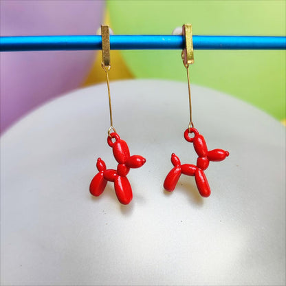 Boucles d'oreilles chien ballon dorées rouge vue 1