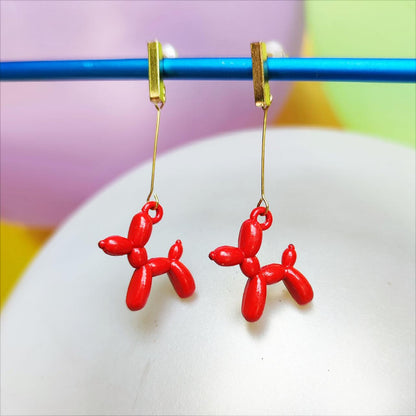 Boucles d'oreilles chien ballon dorées rouge vue 2