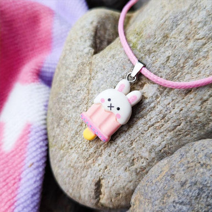 Collier lapin blanc glace animaux vue 2