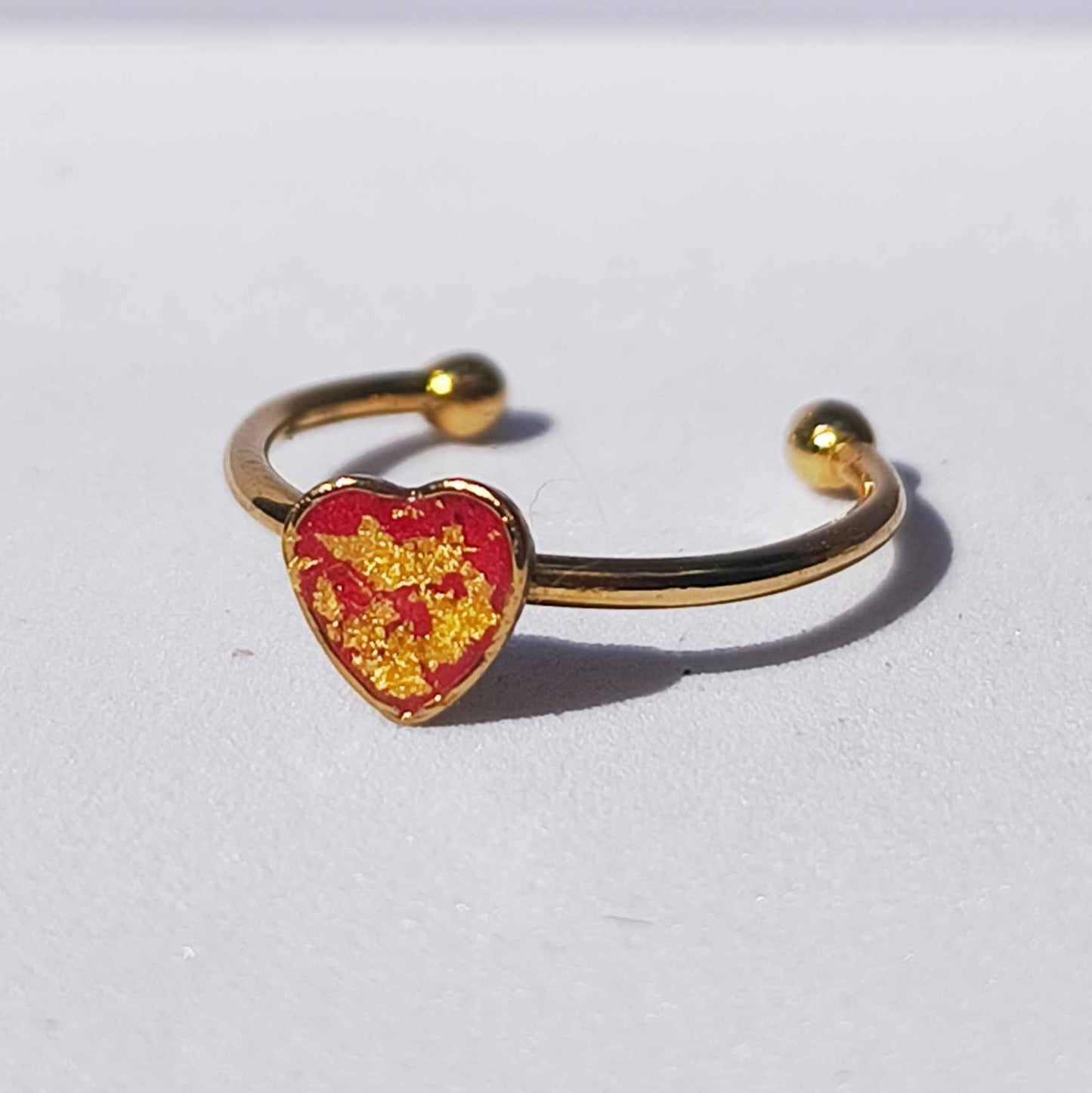 Bague cœur rouge flamboyant avec feuille d’or