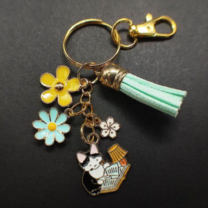 fiche produit Porte-Clé Chat Noir et Blanc avec Lampe et Fleurs